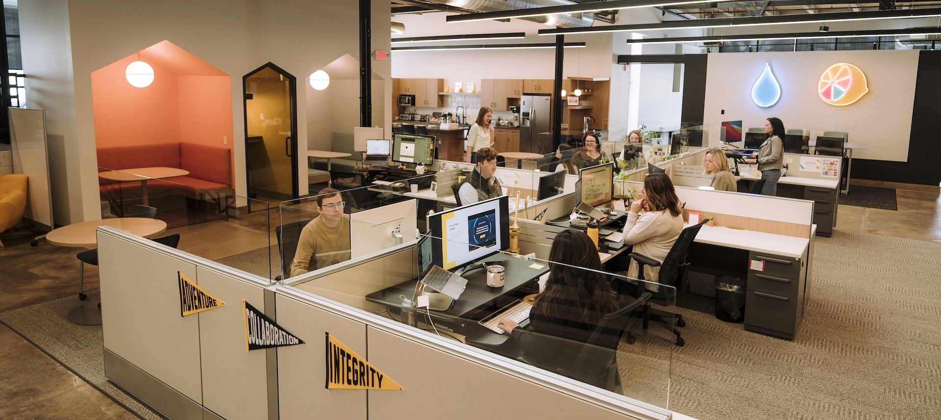 Lemonly team members working in the office