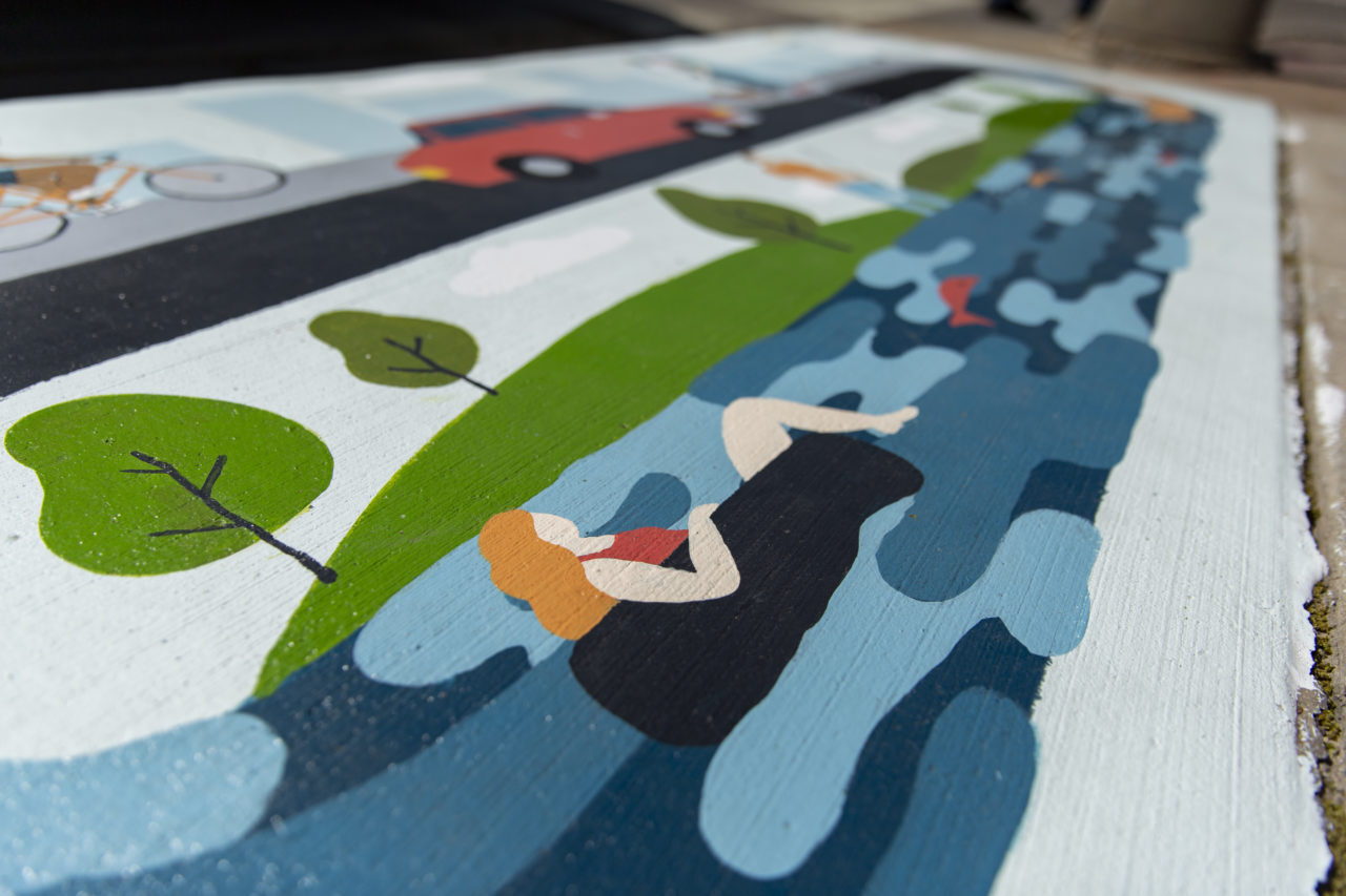 painting of people floating on a river in tubes