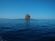 water surrounding massive rock