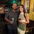 Cortney and her husband, Phil, at a bar with friends