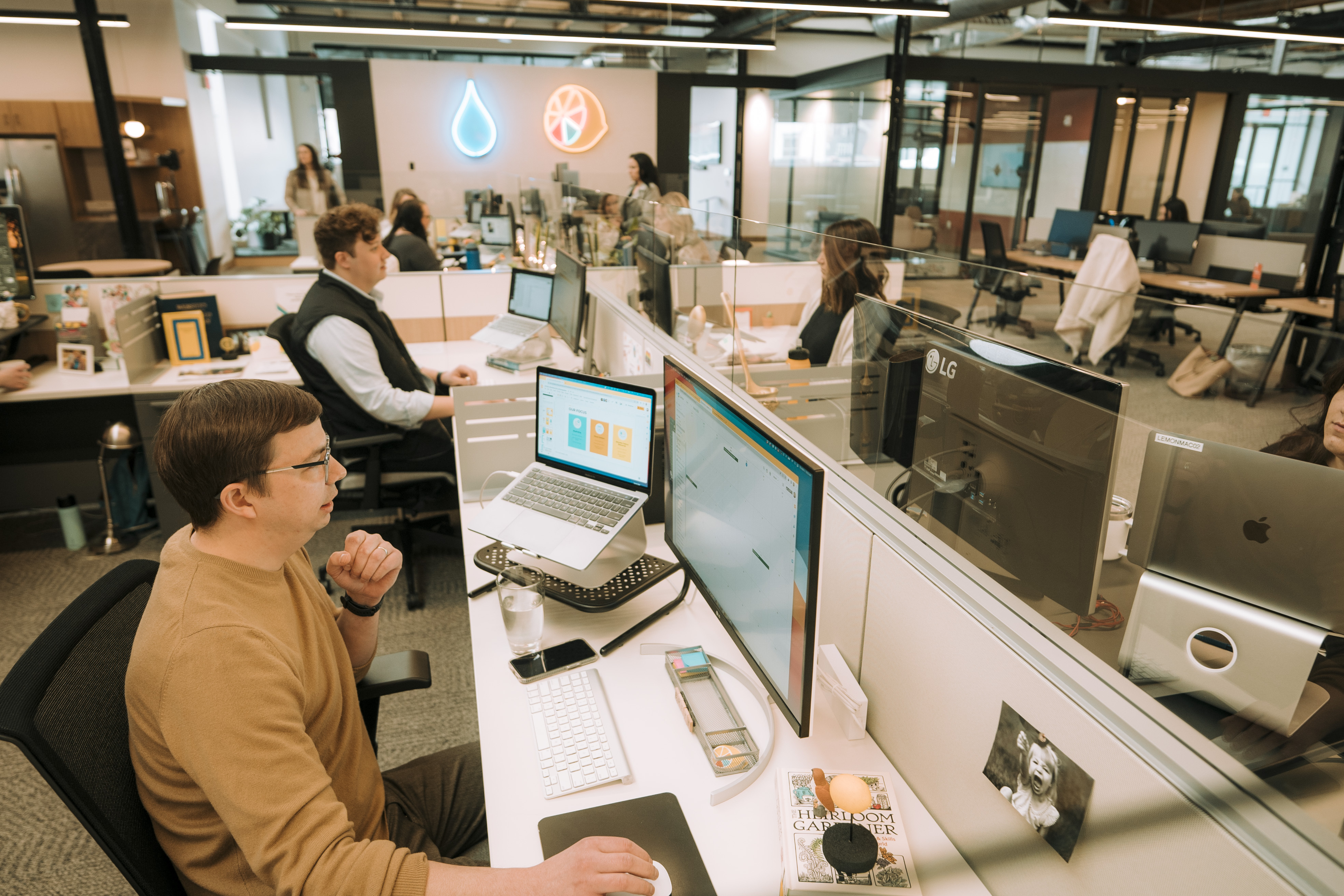 Lemonly team members working in the office